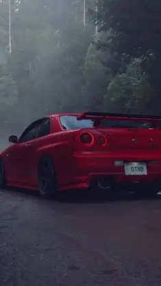 Red Nissan Parked on the Road live wallpaper download