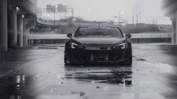 Black Sports Car in the Wet Streets live wallpaper download
