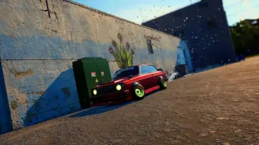 Red VOLVO Parked Near Garage live wallpaper download