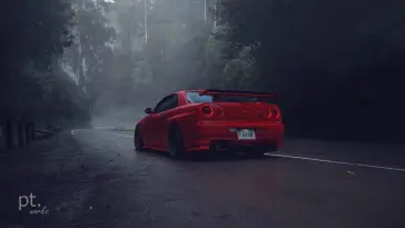 Red Nissan Parked on the Road live wallpaper download